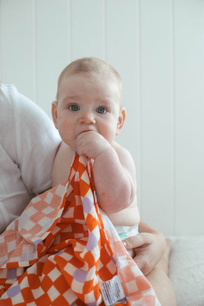 Check Mate Cherry Red with Lilac Speck | Swaddle